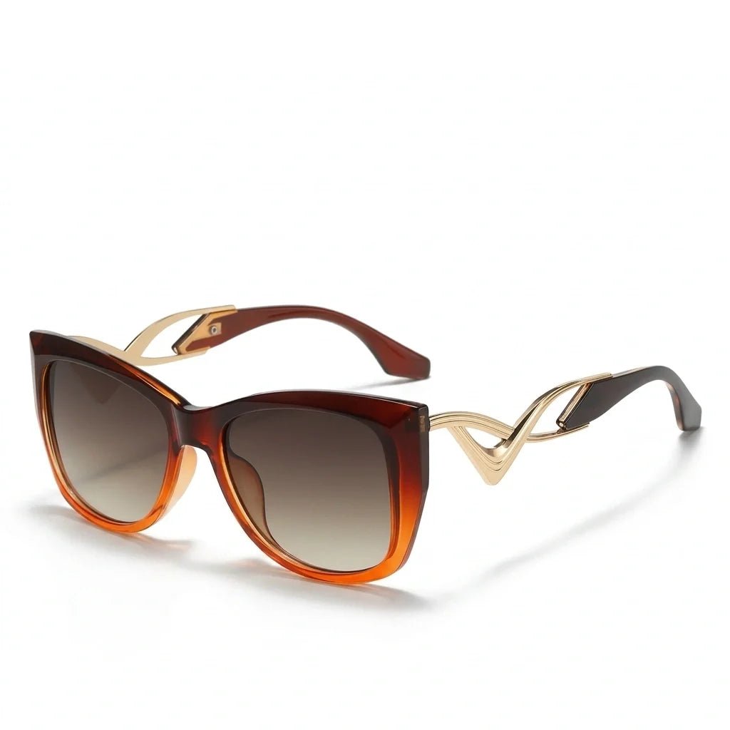 Liora Lunettes de soleil œil de chat oversize UV400 à verres dégradés et détails en métal doré - Hommfer