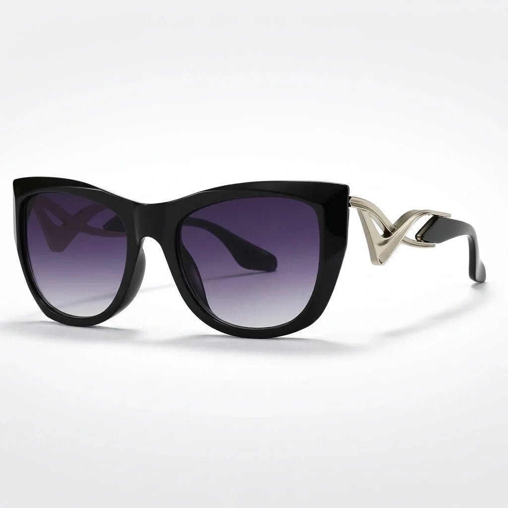 Liora Lunettes de soleil œil de chat oversize UV400 à verres dégradés et détails en métal doré - Hommfer