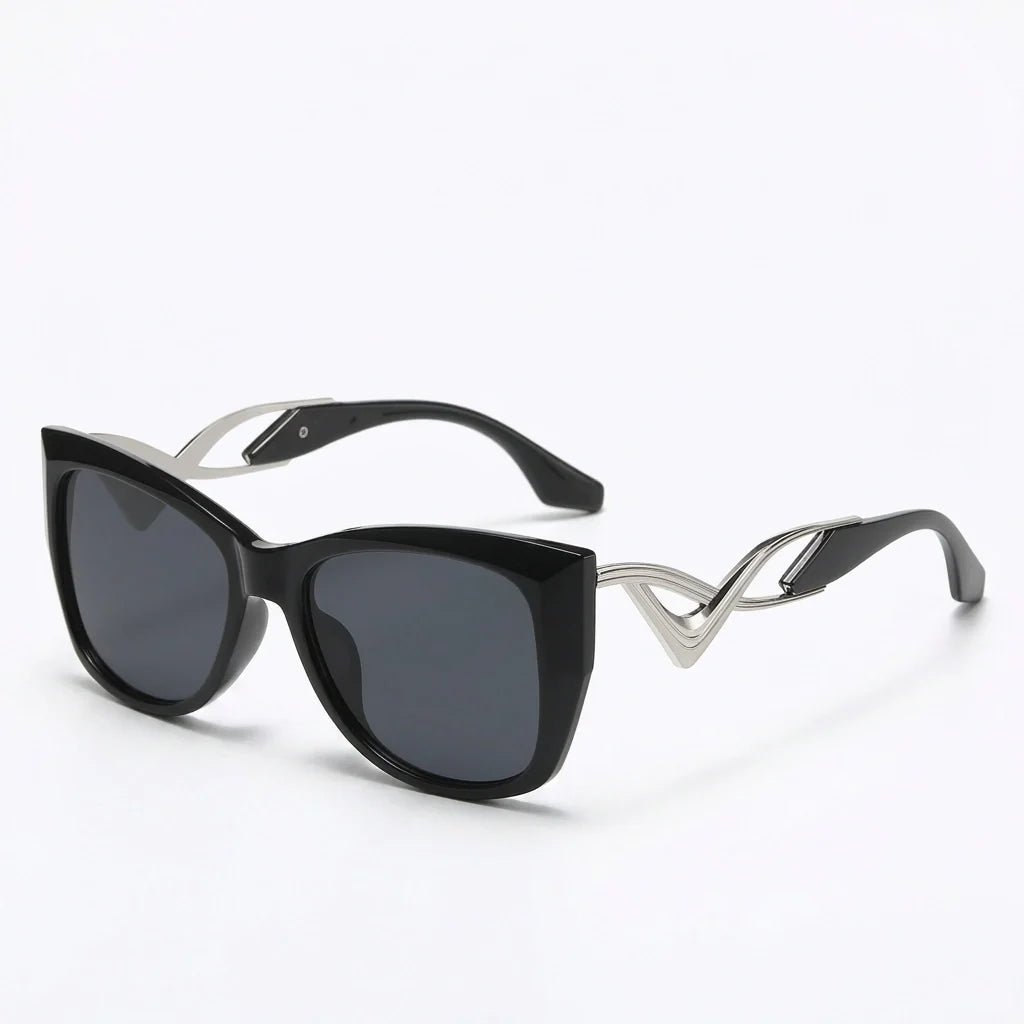 Liora Lunettes de soleil œil de chat oversize UV400 à verres dégradés et détails en métal doré - Hommfer